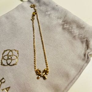 Authentic Kendra Scott “Sasha” gold tone bow bracelet with crystals